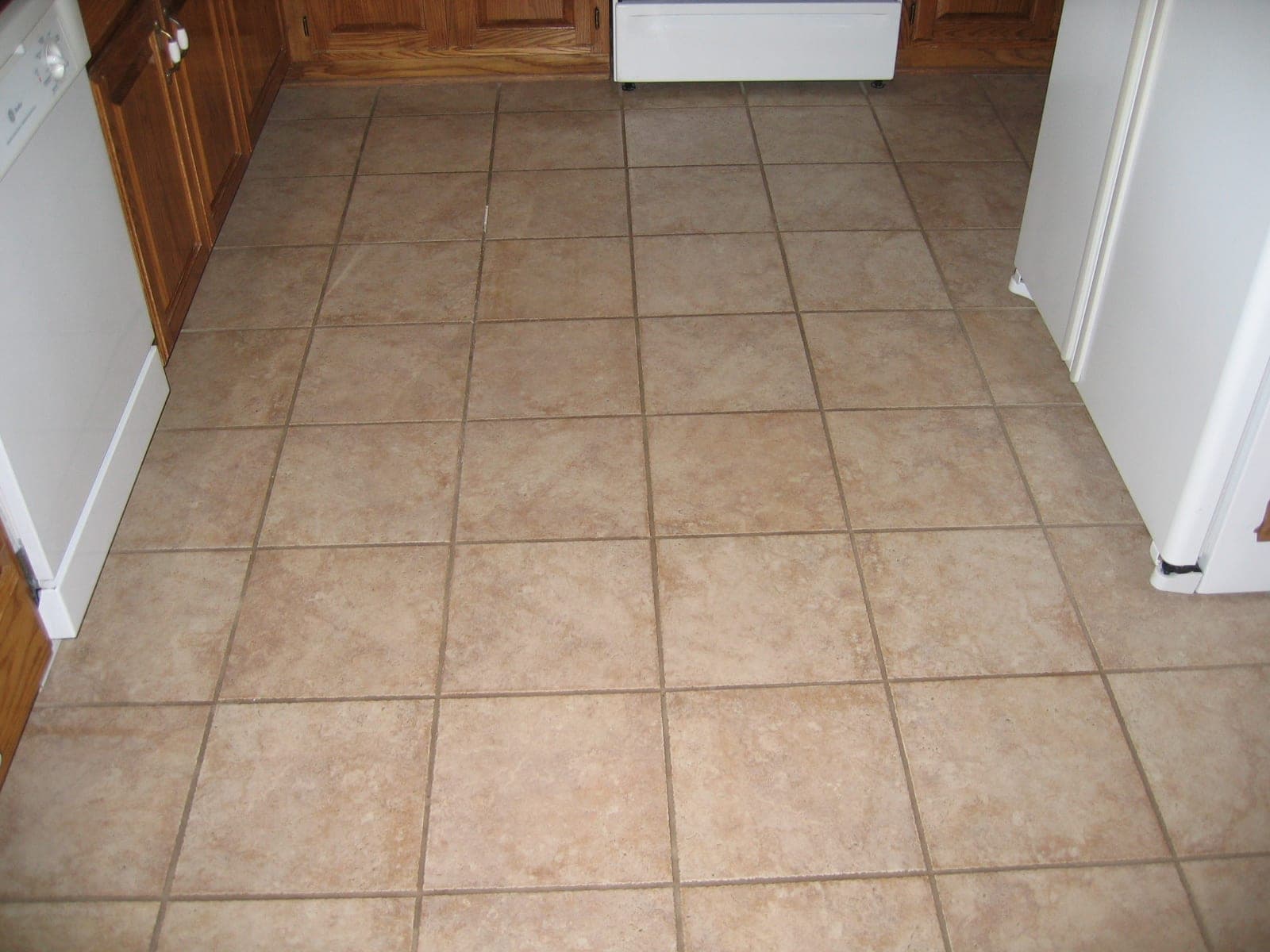 Before: Kitchen floor, grout color sealed