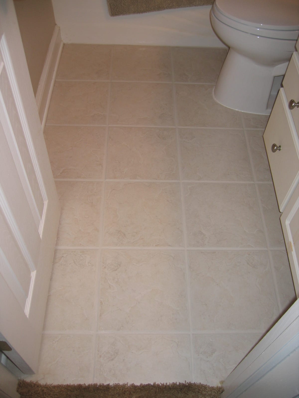 After: Bathroom floor, grout color sealed